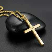 Sterling silver cross pendant necklace yellow gold plated 18 inch cable chain on white background
