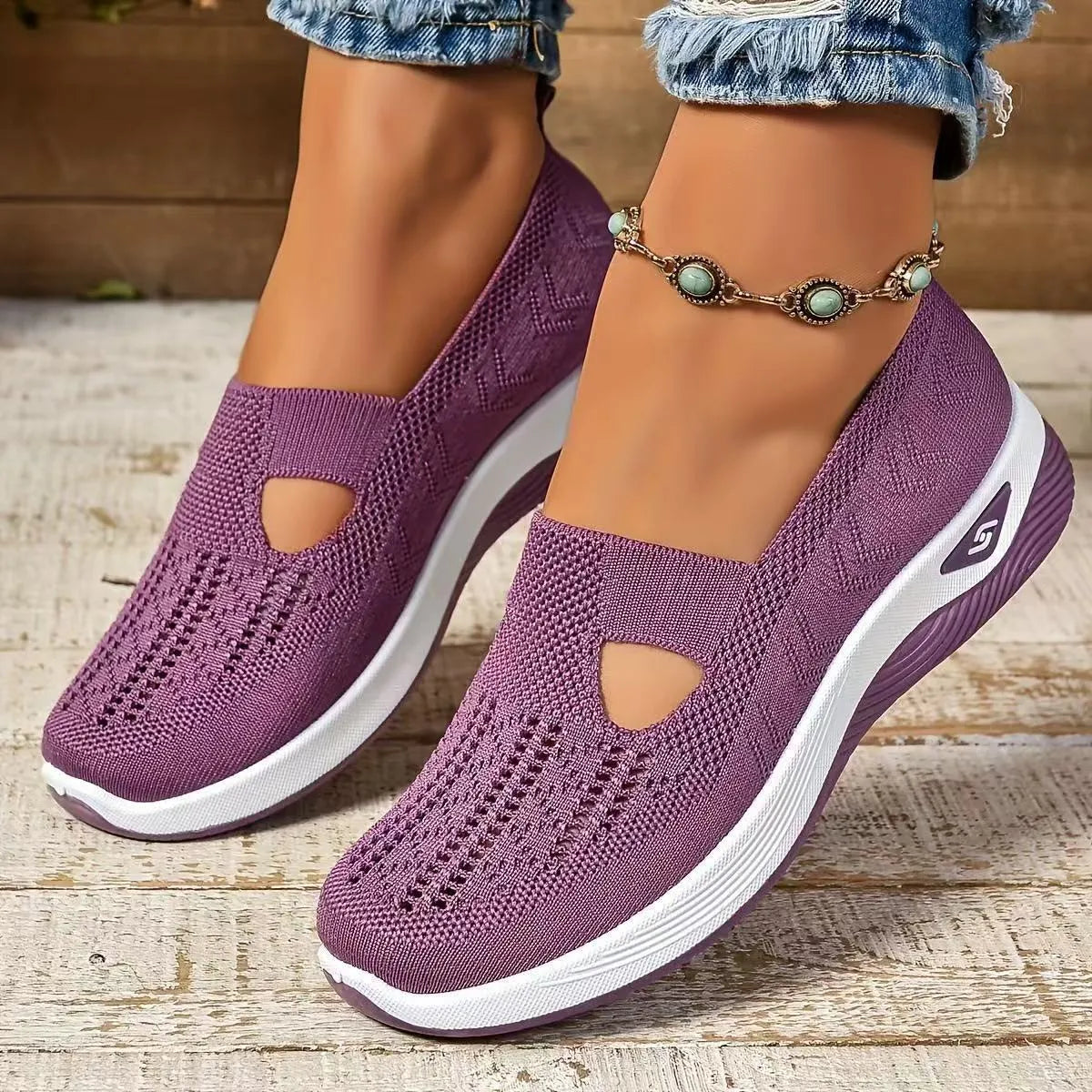 Women's casual mesh shoes with a T-strap and soft PVC sole in multiple colours.
