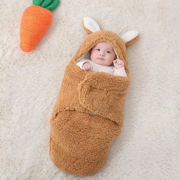 Baby wearing soft fleece sleeping bag with head support and velcro closures