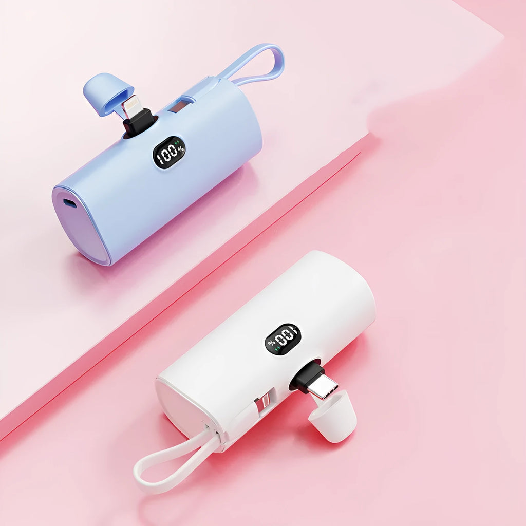 Capsule-shaped digital display wireless power bank in multiple colours with built-in plug.