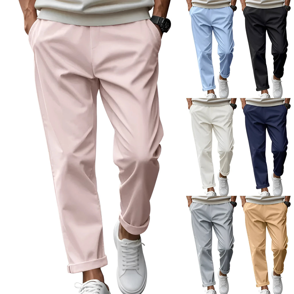 Men's casual trousers in solid grey, loose fit with drawstring waist and side pockets, full length