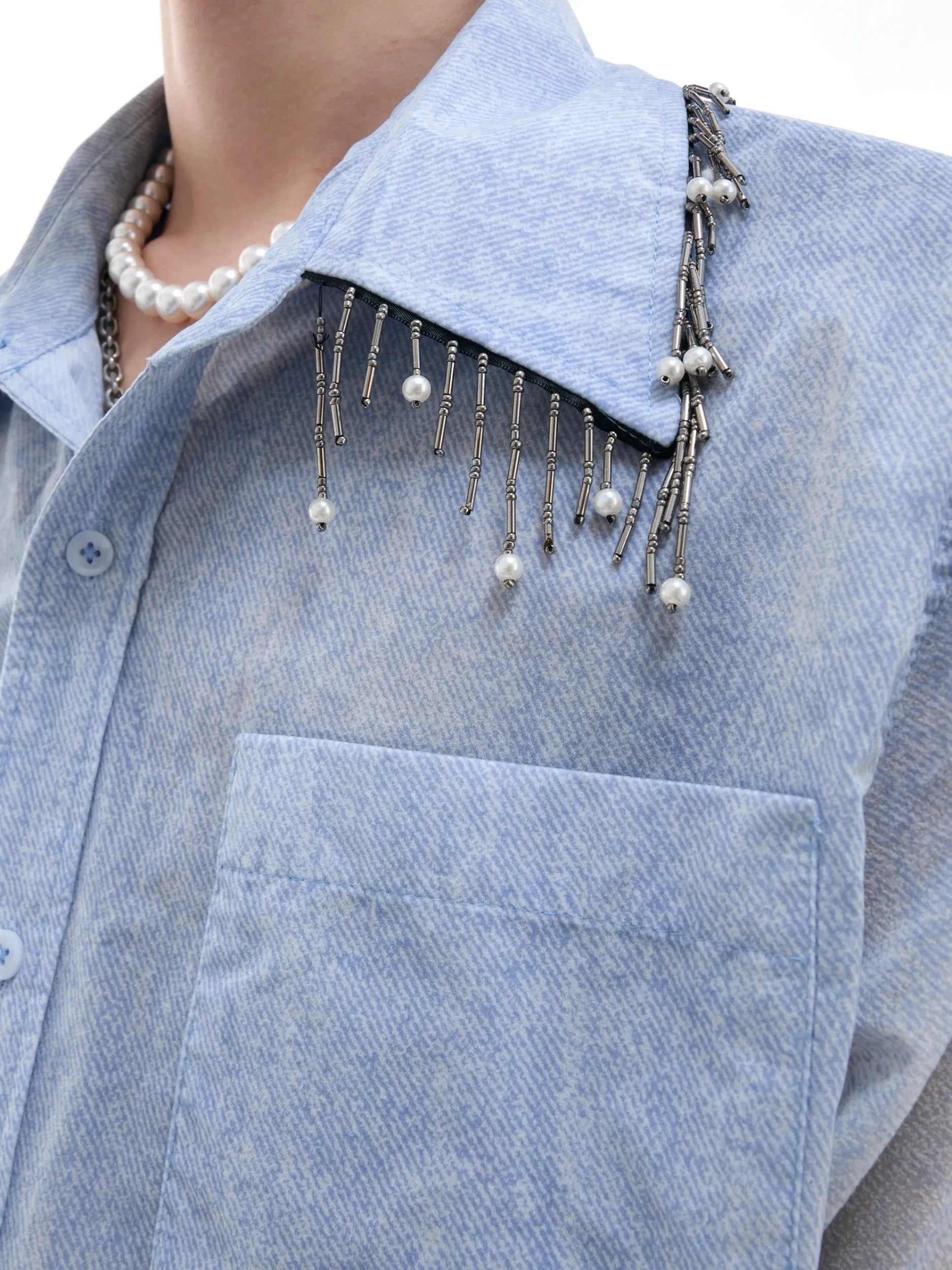 Man's blue and white gradient loose-fitting short sleeve casual shirt on a hanger