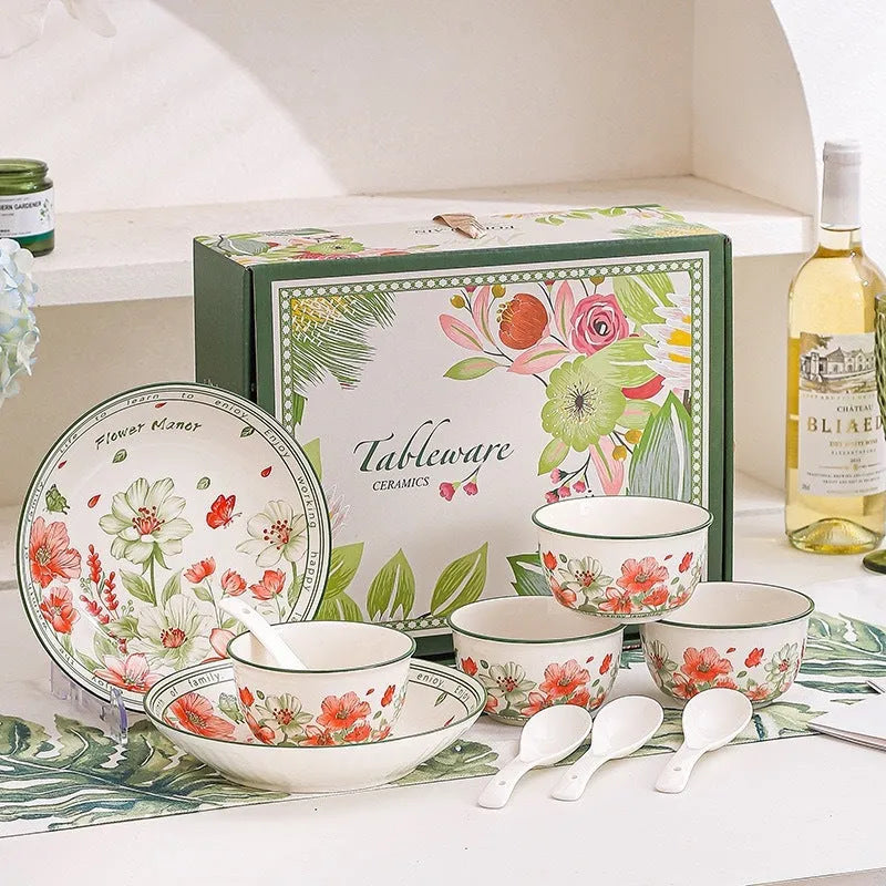 Ceramic tableware gift box set with 4 bowls, 4 spoons, and 2 plates in matching underglaze finish