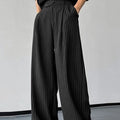 Black men's casual trousers with vertical stripes and front pleats on a high elasticity fabric.