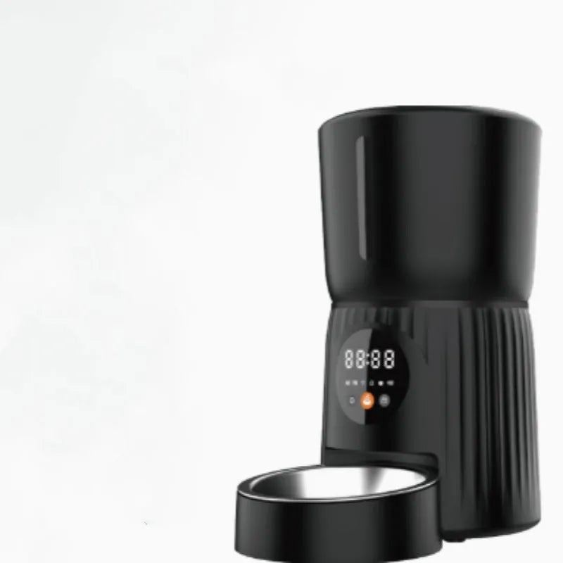 Black and white automatic intelligent pet feeder with USB cable for timed, portion-controlled feeding.