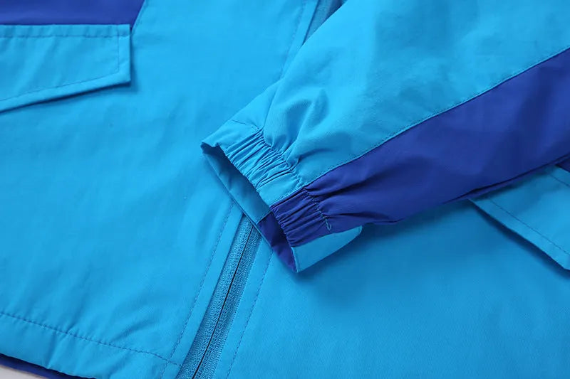 Blue thin long sleeve jacket for boys, with full zip, designed for autumn wear.