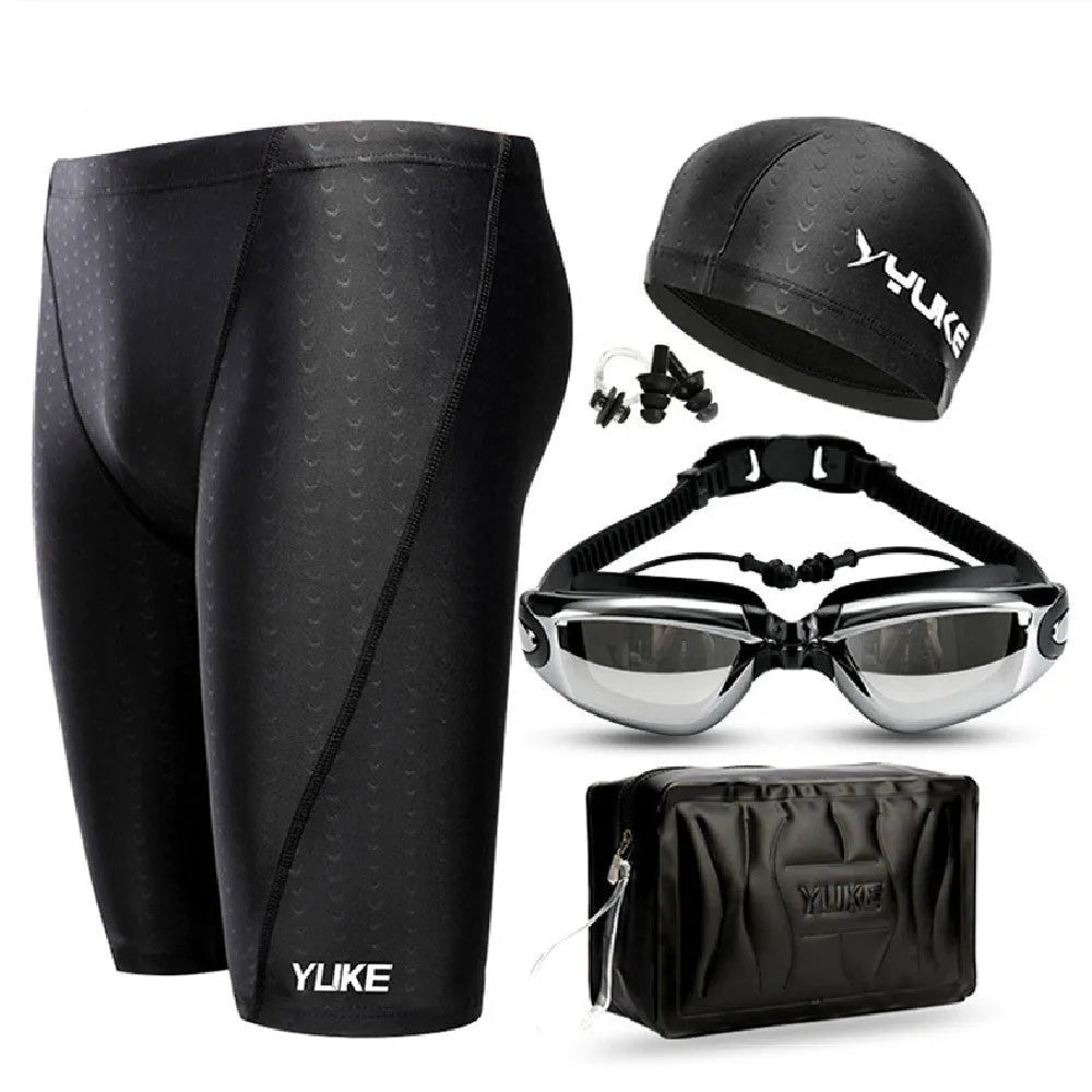 Men's black 5-piece swimming set showing swimming trunks, goggles, cap, ear plugs with nose clip, and carrying bag