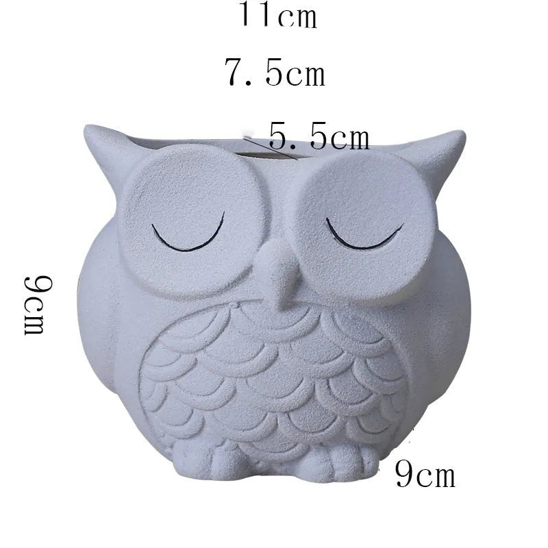 Handmade ceramic succulent pot with cartoon owl design in frosted pastel colour