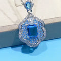Sea blue geometric copper pendant with aquamarine and topaz mirror finish jewellery piece