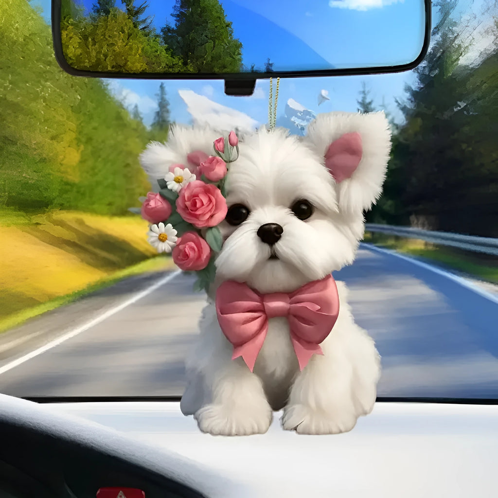 Acrylic plastic decorative pendant for car dashboard in a cartoon style design.