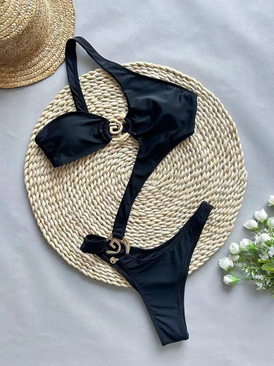 Women's black printed nylon bikini set in sexy style, two piece swimsuit on model