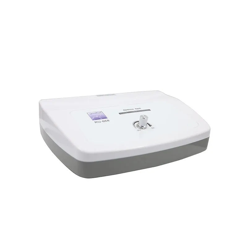 White electronic beauty instrument for professional spot and mole removal treatments in beauty salons