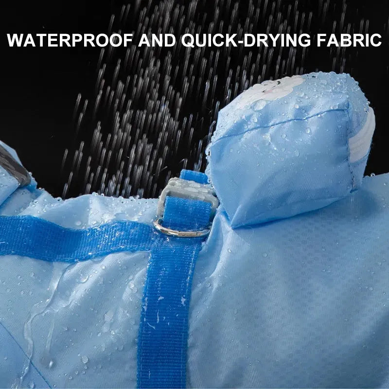 Blue pet dog raincoat with full body and four leg coverage on a small dog