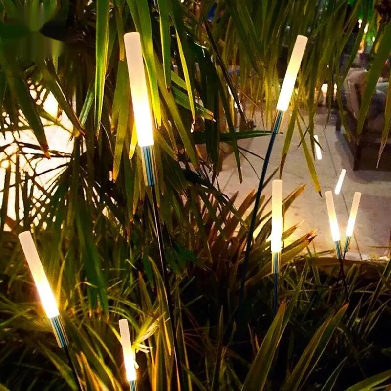 Solar outdoor LED plug lawn lamp with stainless steel wheat design in a garden setting, 1100mm height option
