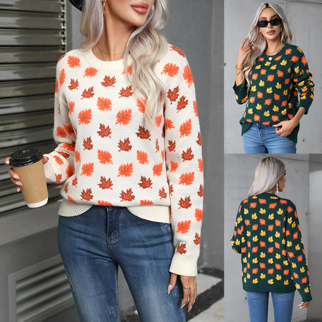 Beige and dark green loose fit Christmas sweater with maple leaf design and round neck.