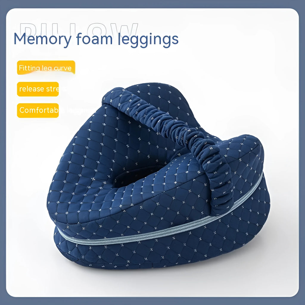 A dark blue jacquard love heart-shaped memory foam leg pillow for adults.