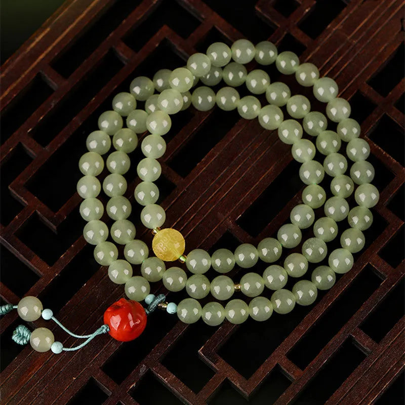 Pale blue Hetian jade bracelet with 6mm beads in three-circle design for women
