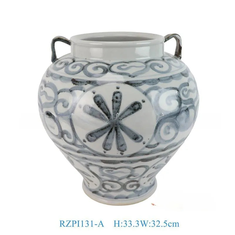 Hand-painted sunflower blue and white ceramic vase on a wooden table