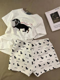 Girls short sleeve pyjama set with sausage dog print and sunglasses design in polyester