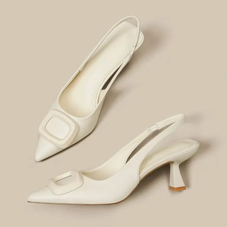 Pointed toe classy high heels with French square buckle in black, cream white, and silver. Microfiber and rubber construction. Sizes 35 to 39.