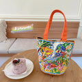 Orange canvas bucket handbag with double shoulder straps and printed letter design