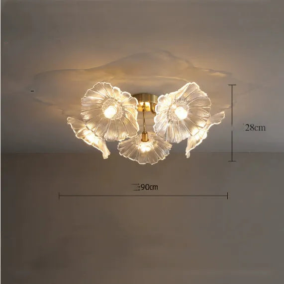 Modern ceiling lamp with cluster of artificial white flowers and warm glowing light.