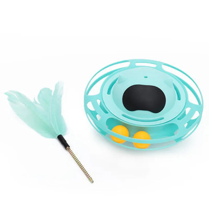 Pink rotating cat tumbler toy measuring 17 by 10 centimetres on a flat surface