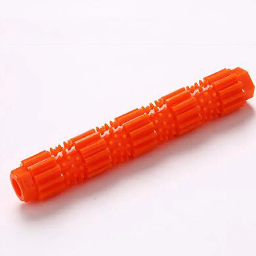 Green and orange rubber dog chew toy with treat dispensing compartment and squeaker for aggressive chewers