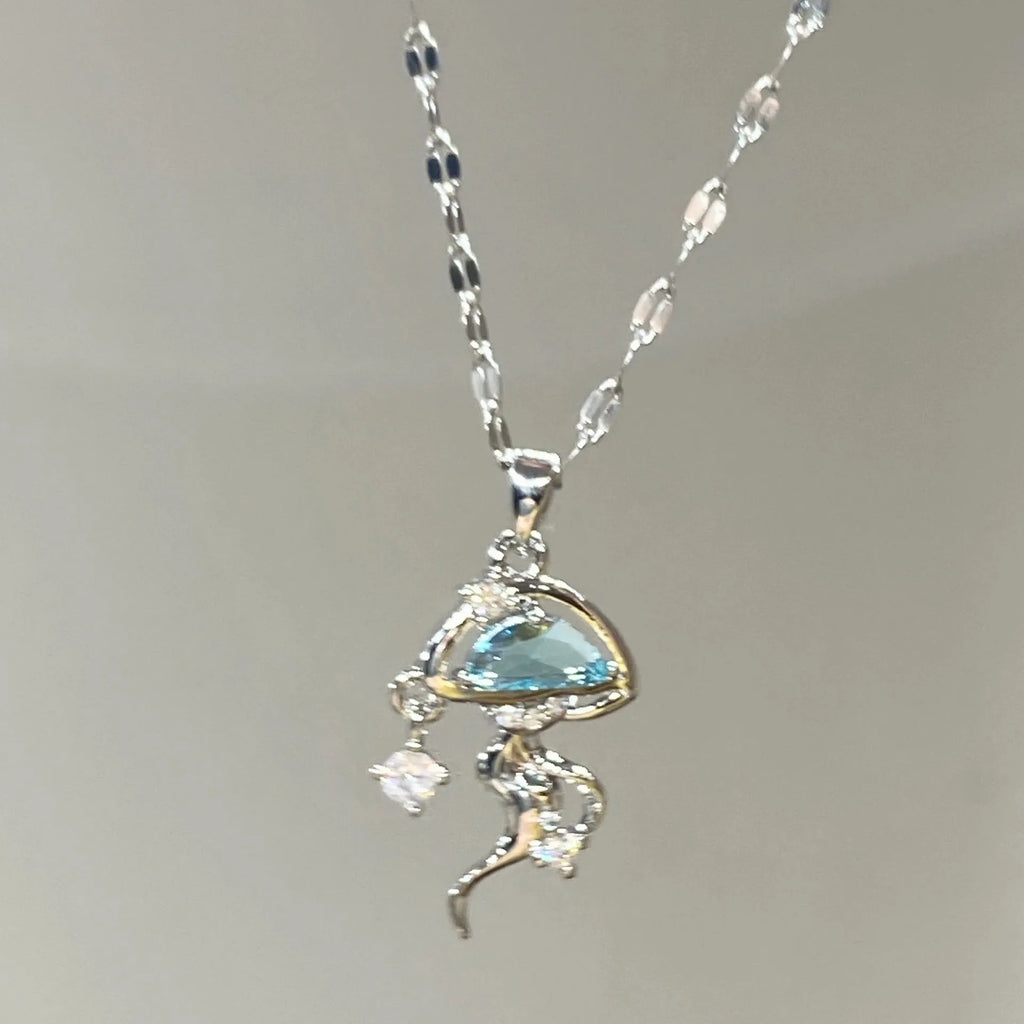 Blue jellyfish charm on sterling silver necklace with adjustable chain