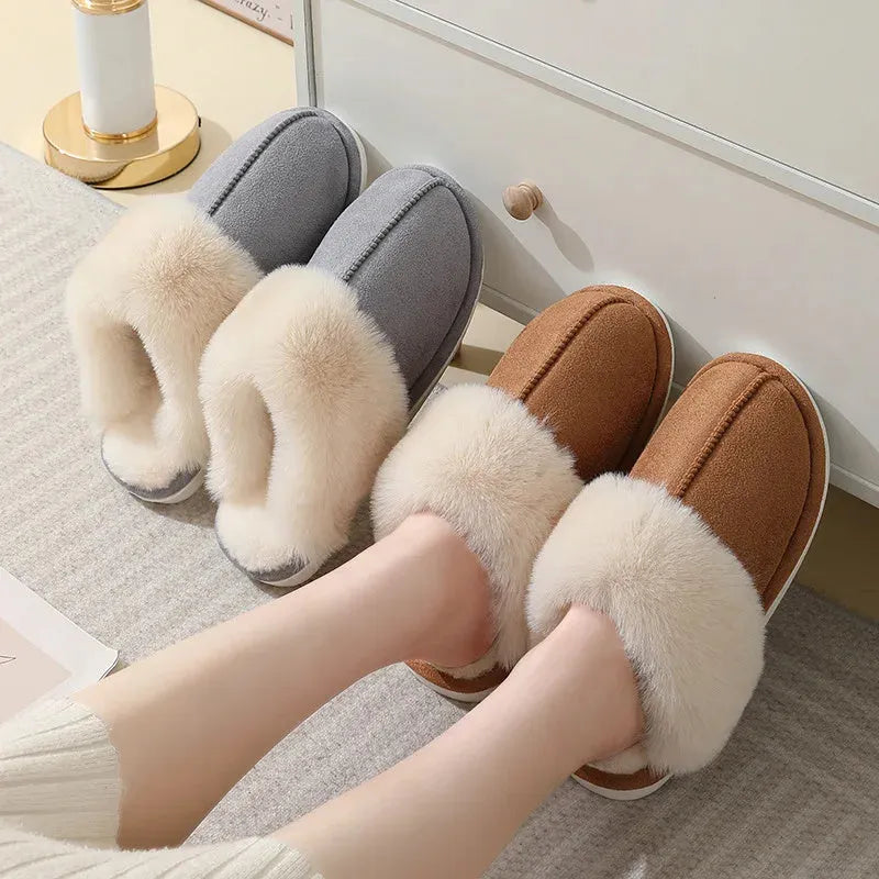 Women's brown plush indoor slippers with a round toe, flat heel, and a textured PVC sole.