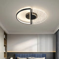 Modern LED ceiling light with monochrome white light, available in 45cm golden feather or 55cm black finish for bathroom