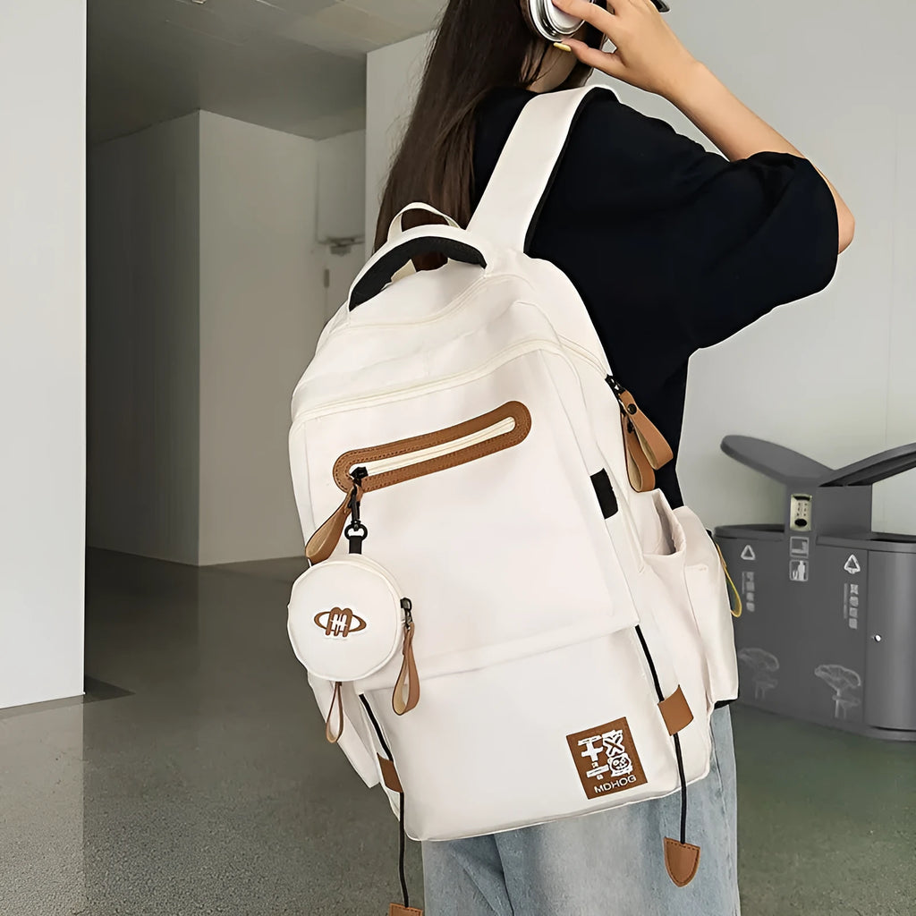 Waterproof nylon leisure travel backpack in multiple colours with 20-35L capacity and contrast stitching