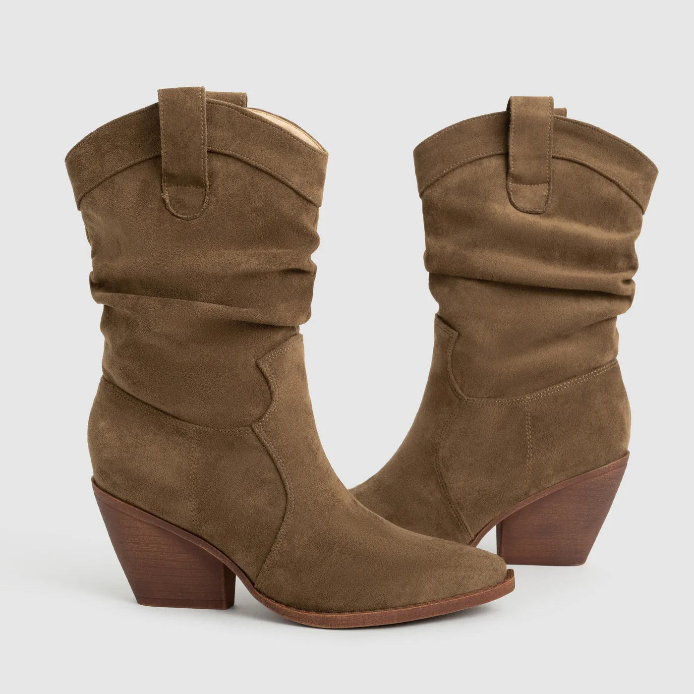 Women's thick heel ankle boots in brown with belt buckle detail and pointed toe