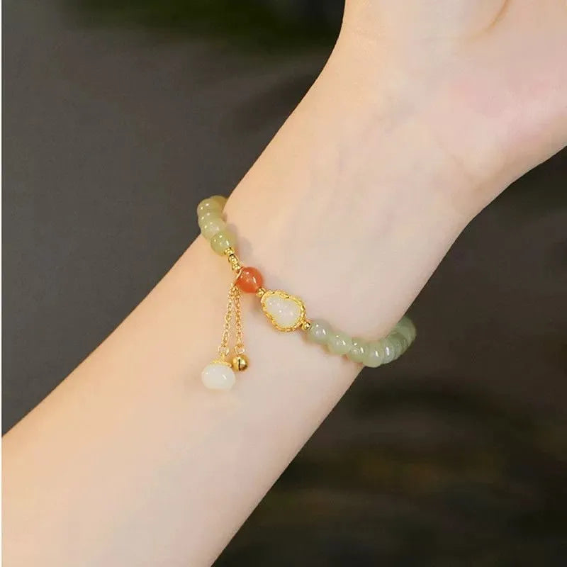Qingshui jade women's bracelet with gold plated 6mm beads and Chinese fu character