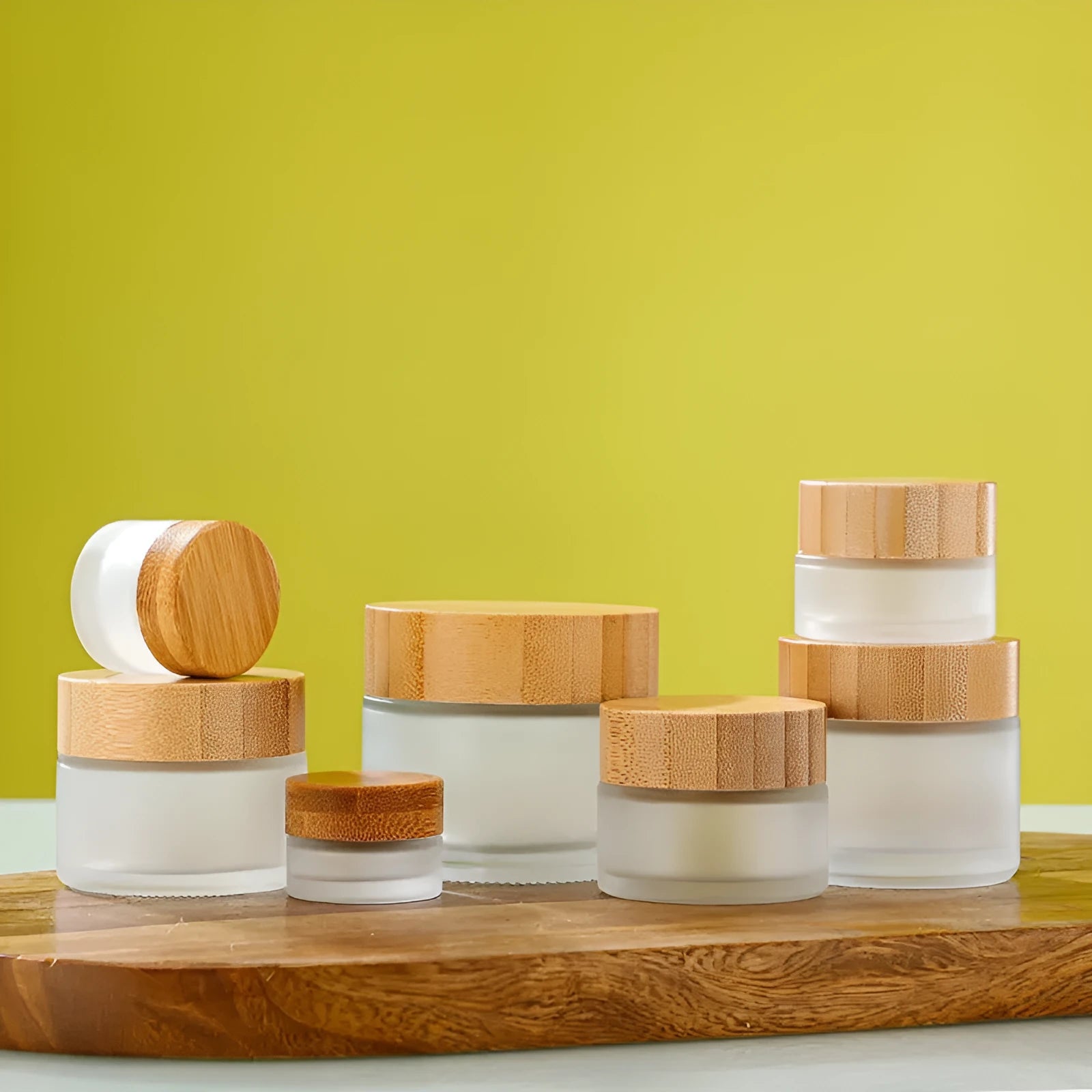 Refillable glass cream jar with bamboo wood lid, transparent finish, 100g capacity