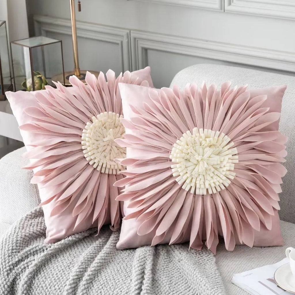 White polyester velvet cushion cover with blue chrysanthemum tufting pattern and fringed hem on a sofa