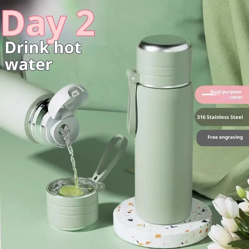 316 stainless steel insulated thermos cup with tea and water separation, in army green, 500ml capacity, on a white background