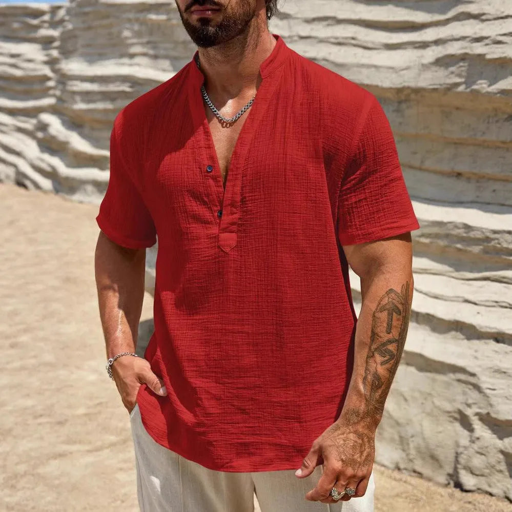 Men's solid colour short-sleeved stand collar shirt in a lightweight fabric on a hanger.