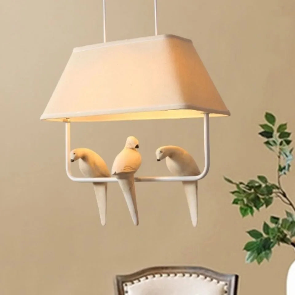 Iron and fabric bird chandelier ceiling lamp with decorative bird silhouette shade.