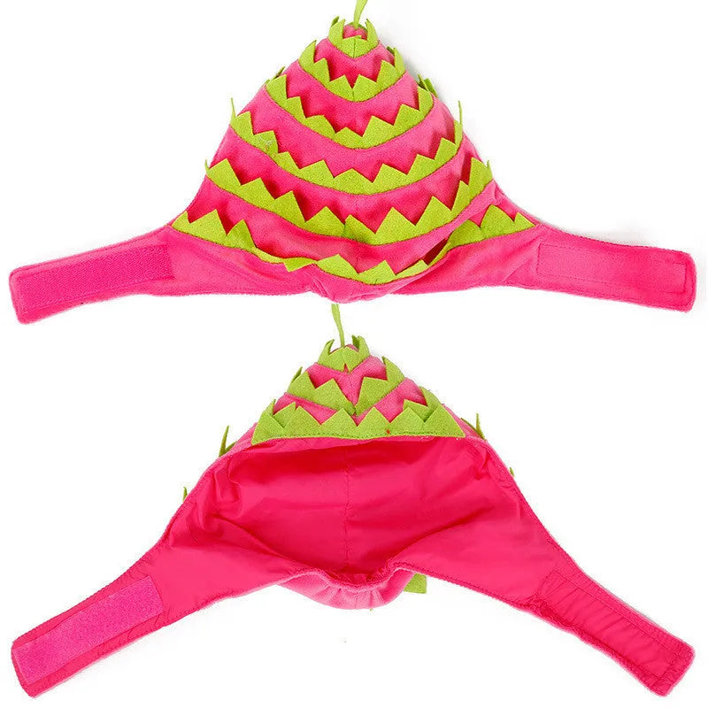 Pitaya fruit design pet hat in pink and green, soft velvet with felt embellishment, side view on a dog
