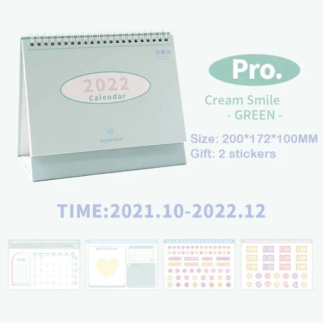 2022 paper desk calendar with coil binding, Regular or Professional size, in green, pink, purple, or yellow.