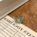 Simple copper women's ring with a Chinese butterfly design, showing an example from the 33 available numbered styles.