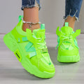 Women's platform mesh dad sneaker in multiple colours with lace-up front and thick sole.