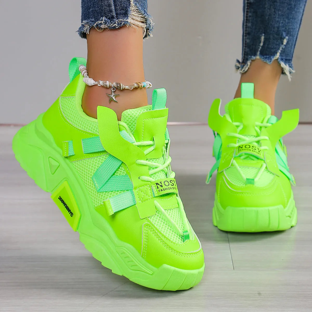 Women's platform mesh dad sneaker in multiple colours with lace-up front and thick sole.
