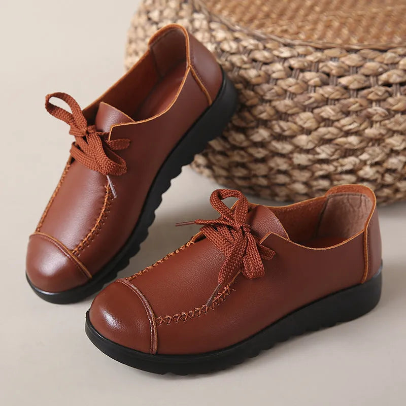 Women's work shoes in colour 6018 Black with round toe, front lacing, and anti-slip sole
