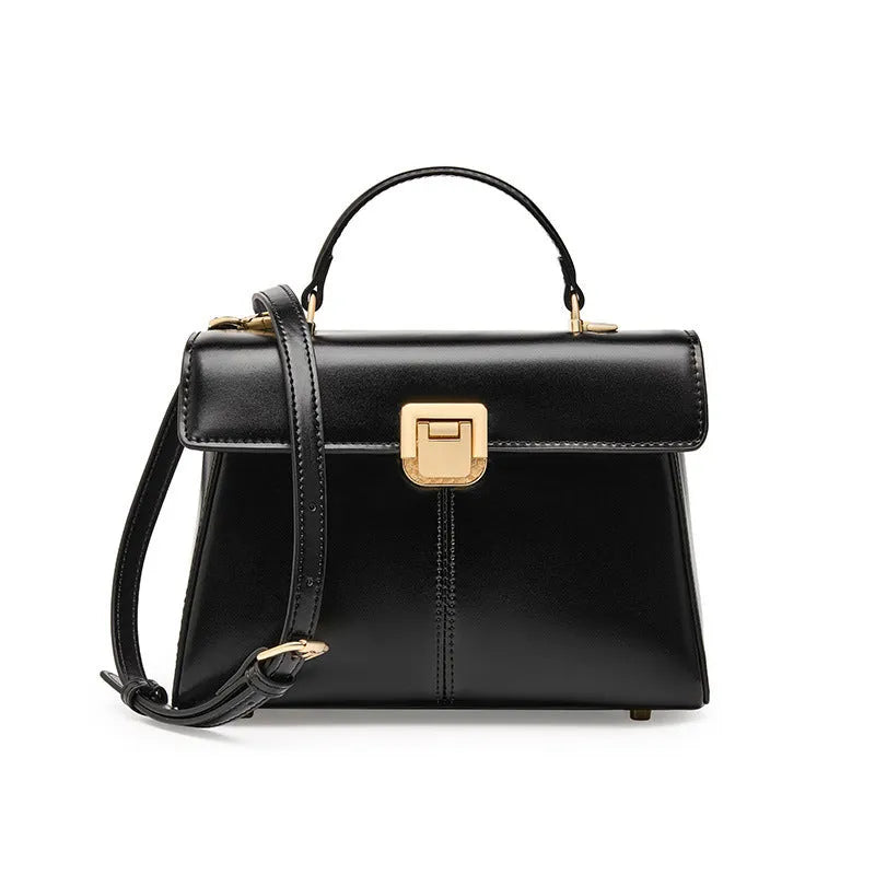 Black genuine leather women's clasp shoulder bag with square shape and long strap.