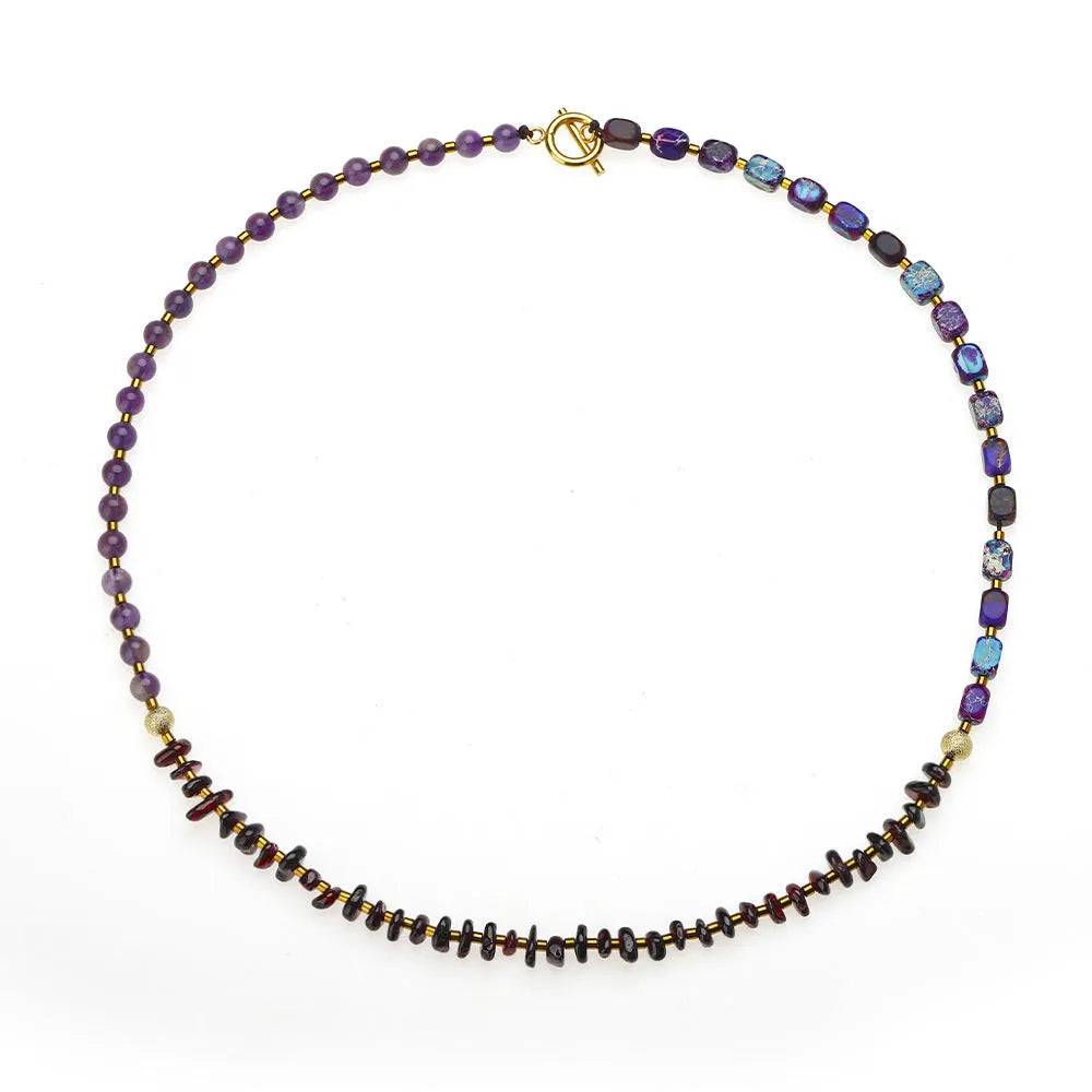 Purple amethyst and garnet round stone bead bracelet with geometric shapes