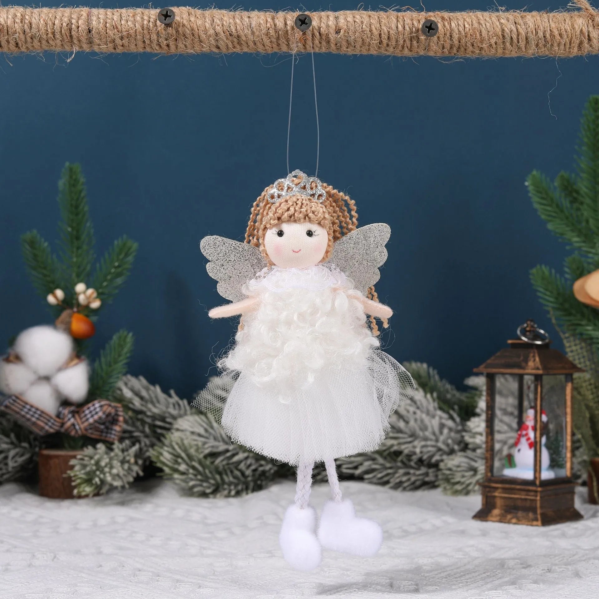 Cartoon-style Christmas angel fabric hair pendant on a girl's high ponytail.
