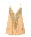 Light yellow ethnic print V-neck sling dress skirt with sleeveless design and short length.