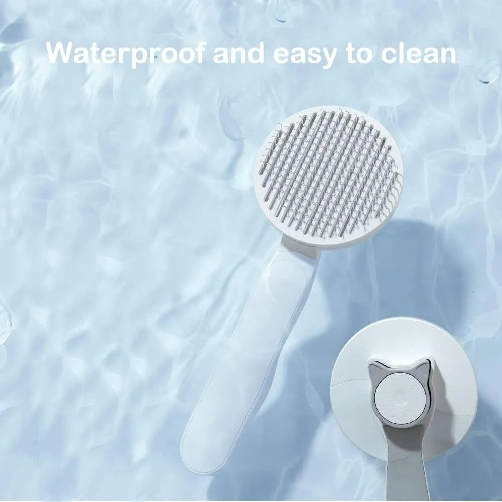 Self-cleaning pet brush with blue rubber handle and metal pins, shown with removed fur.